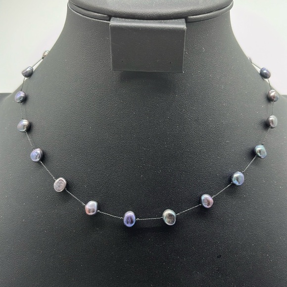 Jewelry - 19 inch Peacock Pearl necklace, individually knotted on cord, lobster closure
